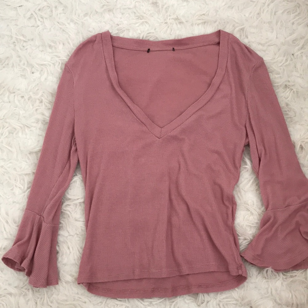 pink v-neck shirt